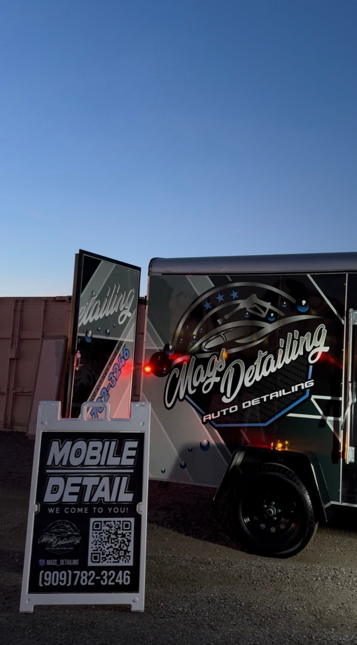 Alexs Detailing auto detailing mobile service truck with signage advertising mobile detail services and phone number